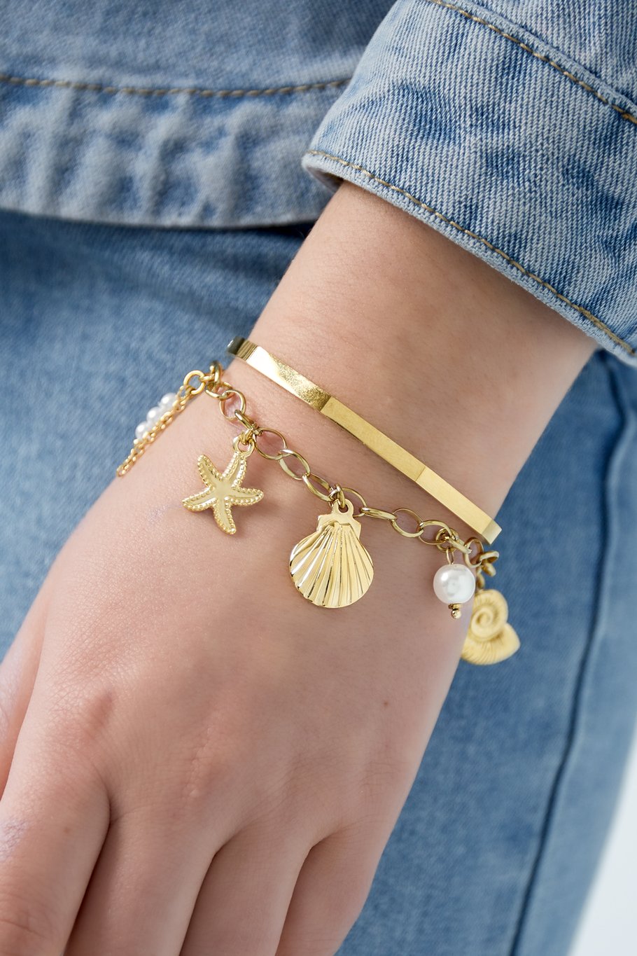 Gouden beach/parel armband