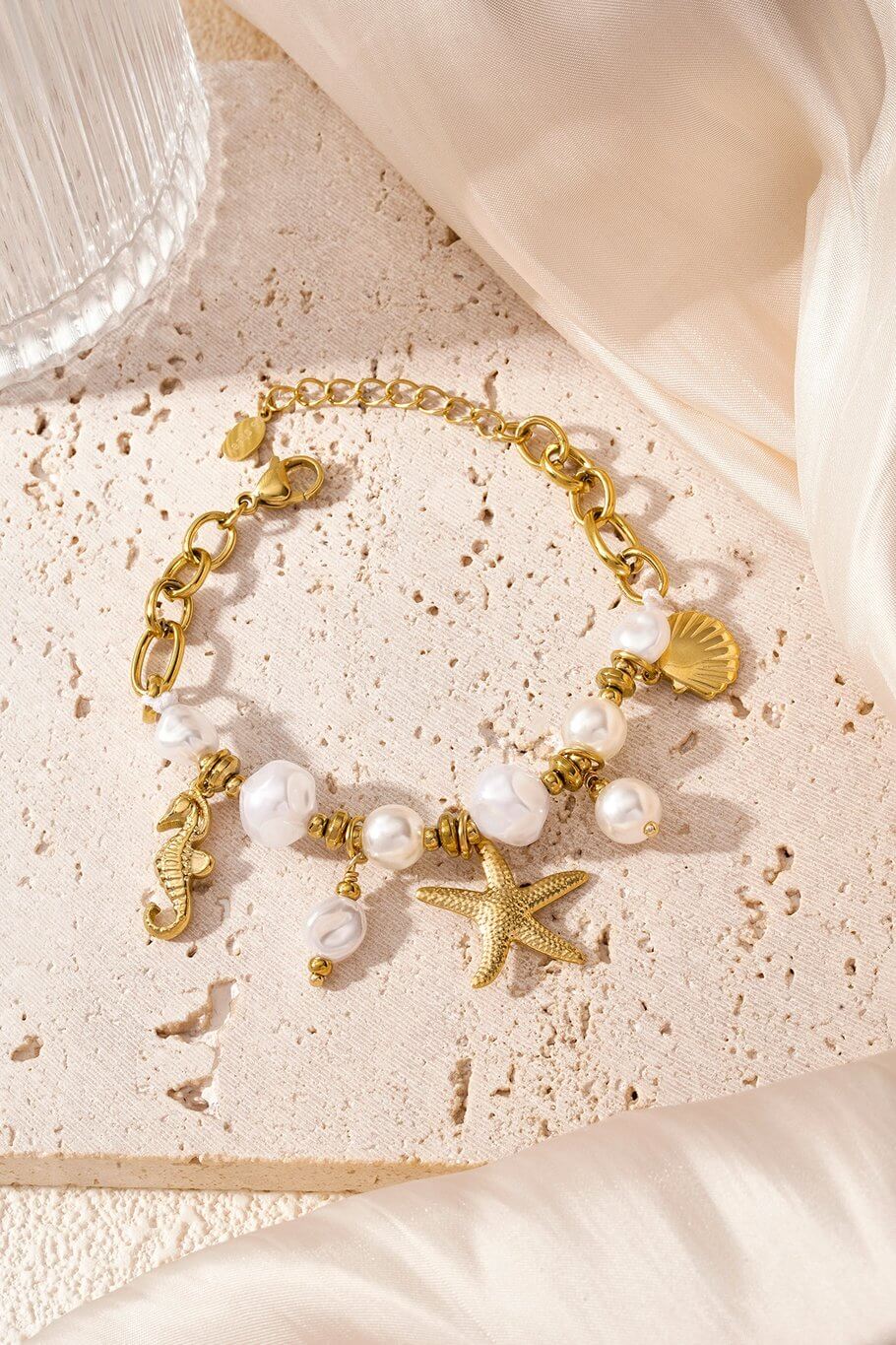 Gouden parel/zeester armband